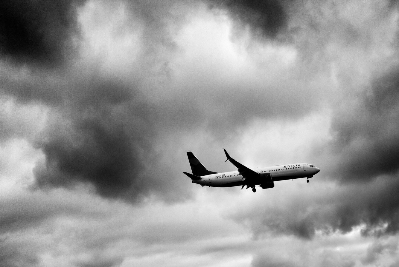 Plane in Clouds black and white